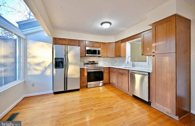 Beautiful, freshly updated townhome with a contemporary feel in the Wootton high school district!