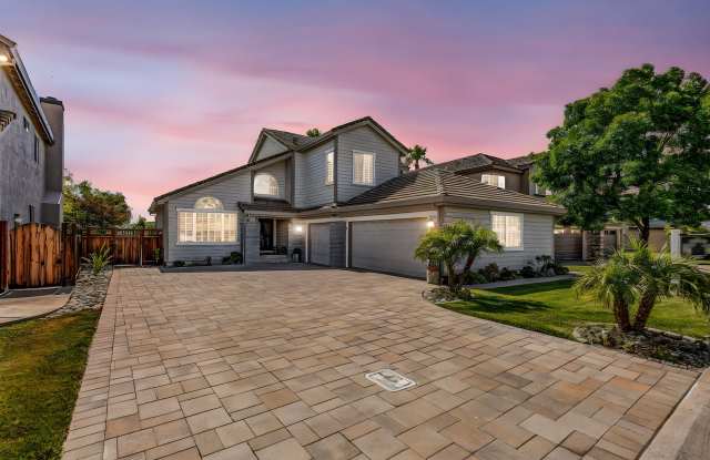 FANTASTIC UPDATED BEAUTY IN THE GATED GOLF COURSE COMMUNITY!!!