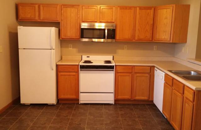 Spacious 2BD 2 BA duplex with 2 Car attached garage. Just a few steps away from everything you need!