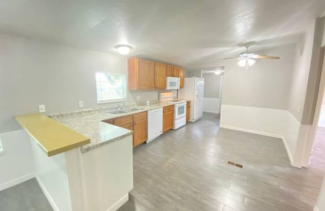 Charming 3-Bedroom, 2-Bath Home with Fenced Yard !