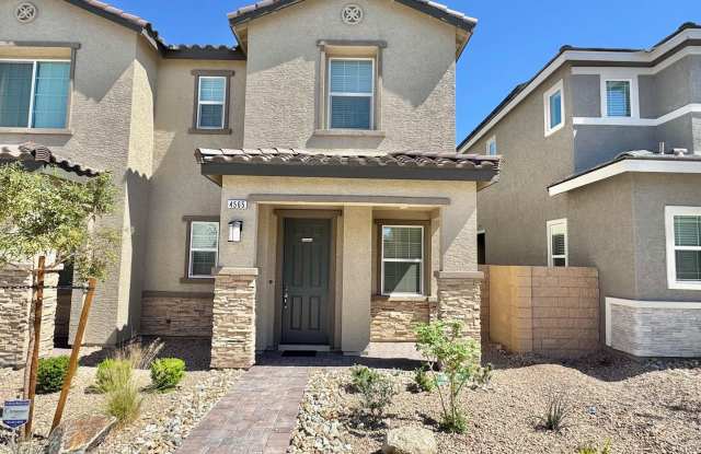 Photo of RICHMOND AMERICAN DESIGNER HOME FEATURING CENTER-MEET SLIDING DOORS, STAINLESS STEEL GE APPLIANCES