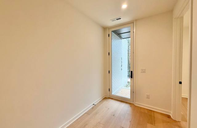 Luxurious New Construction 4BD, 2.5BA Raleigh Townhome with a Rooftop Terrace in a Prime Location Near Tons of Shopping  Dining Options