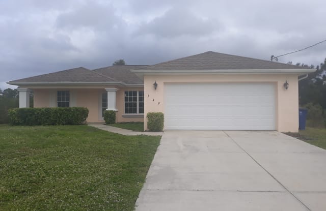 349 Pinehurst Ave - 349 Pinehurst Avenue, Lehigh Acres, FL 33974