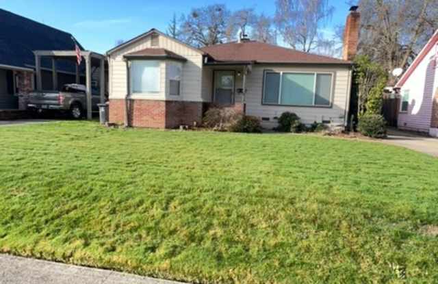 Photo of 2BD/1BATH - NORTHWEST GARAGE, LANDSCAPED YARD  WASHER/DRYER HOOKUP