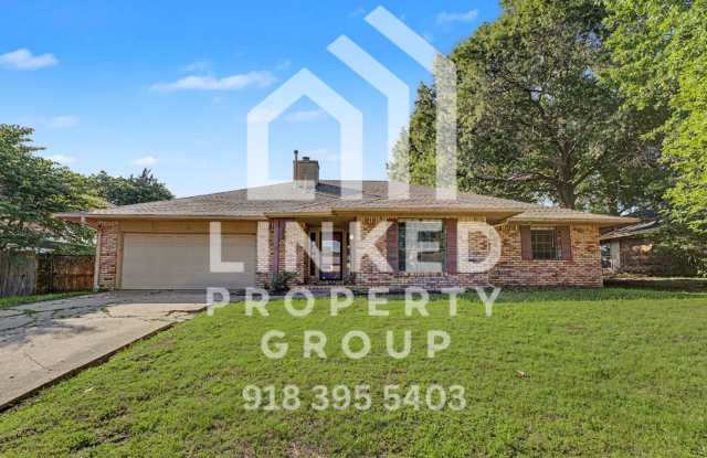 Check out this 4 bedroom 3 bath brick home in Tulsa