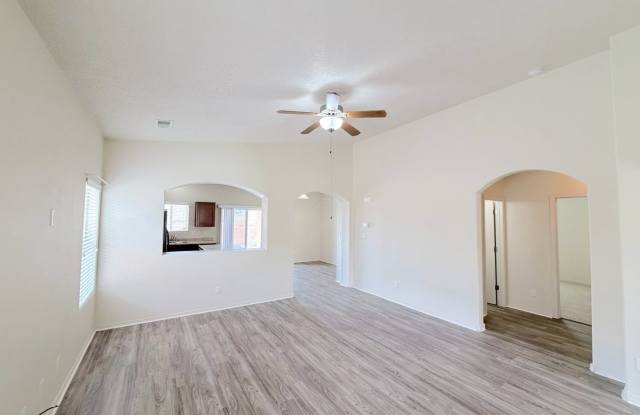Beautiful 3 bed 2 bath in SW Albuquerque! Spacious layout. New Flooring! 2 Car Garage. Near 98th and Gibson.