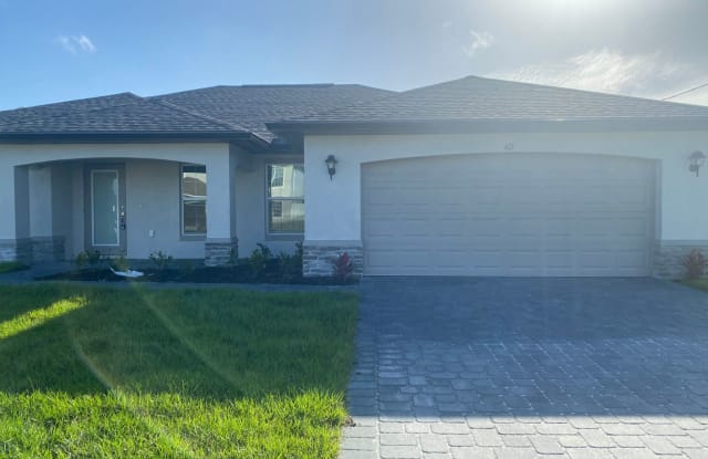 417 NW Juanita Court - 417 Northwest Juanita Court, Cape Coral, FL 33991