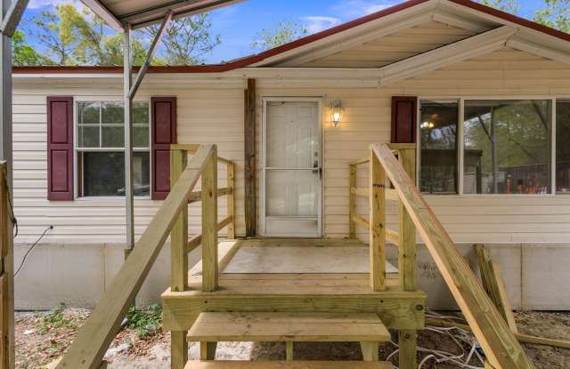 Photo of Updated 3 bedroom 2 bath home with Commercial building