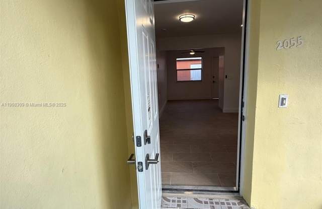 2051-2055 NE 167th St