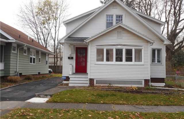 (STUDENT HOUSING) Stunning 5 bedroom, 1 Office/Zoom room, 2 bathroom with hardwood floors, large windows, decorative fireplace and custom features throughout! - 197 Rossiter Road, Rochester, NY 14620