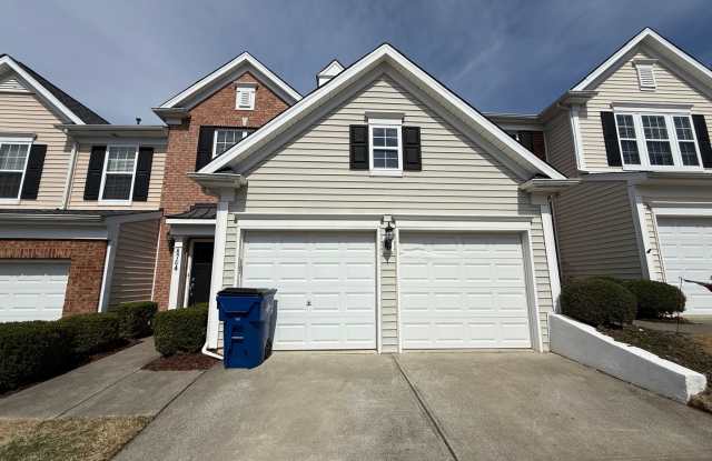 Charming 3BD, 2.5BA Raleigh Townhome with a Fenced Yard Near Shopping, Dining, Interstates, and RDU Airport