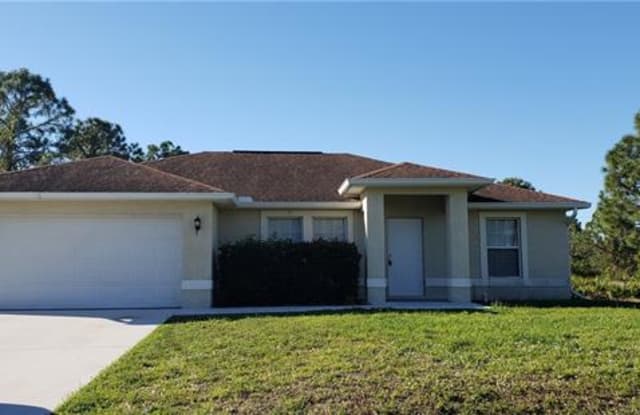 1146 Venetia ST - 1146 Venetia St E, Lehigh Acres, FL 33974