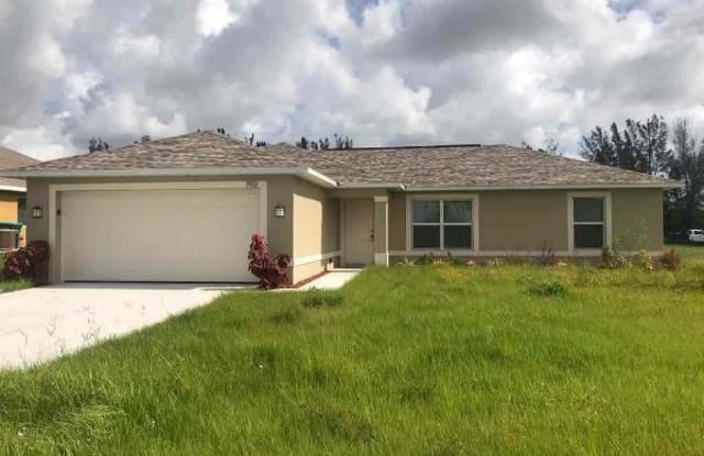 703 SW 13th TER - 703 Southwest 13th Terrace, Cape Coral, FL 33991