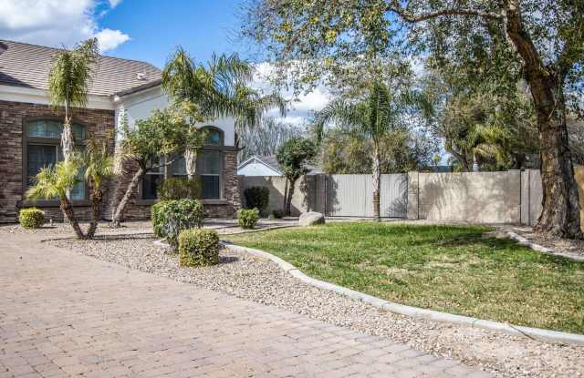 Ultimate SINGLE LEVEL Family Residence!Beautiful 5BR/3.5BA Custom Home with Pool in Private Gated Falcon Estates!