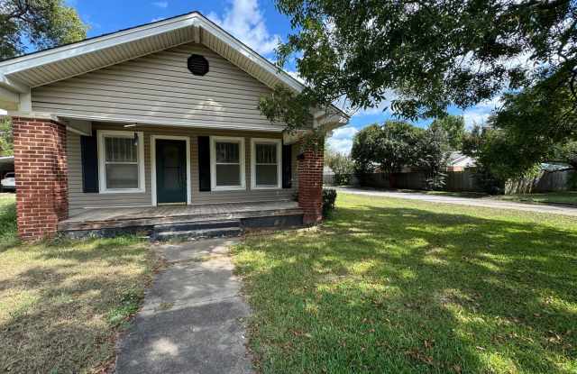 Three bedroom two bath home with central heat and air, large fenced backyard, and carport!