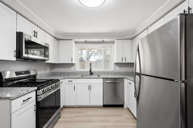 Photo inspiration: Fantastic Apartment Renovation With Texture Reference: Spacious 3 Bedroom Ranch With Finished Basement And Attached Garage