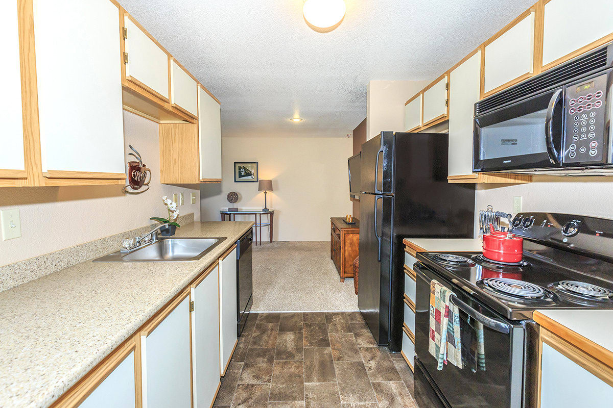 Cambridge Court - With the largest apartments in Olympia, up to 1,300 square feet of living space, Cambridge Court Apartments offer uncompromising value