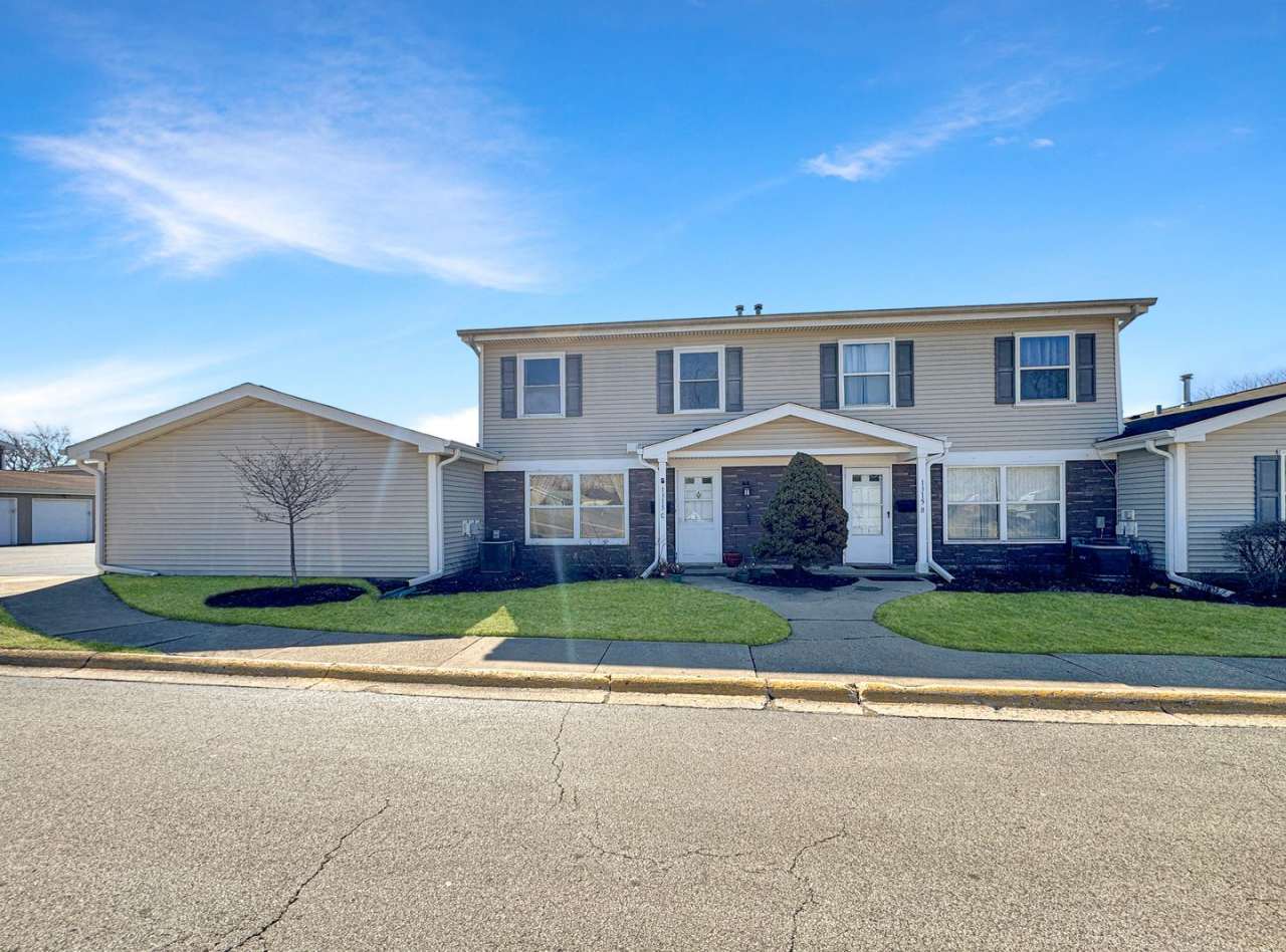 Two Story Three Bedroom 1.5 Bathroom Townhome with private entrance and garage