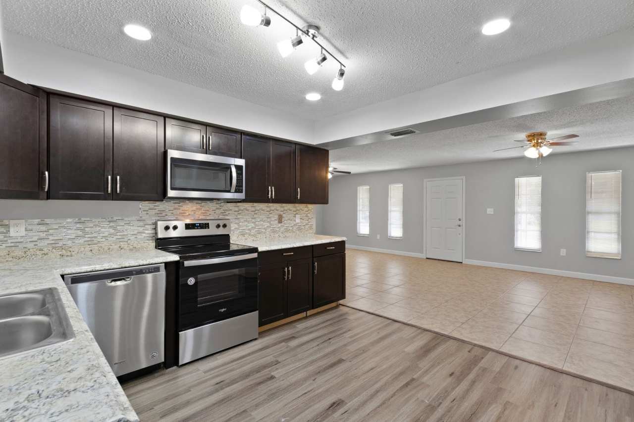 Central 3/2 with Recent Upgrades and Enclosed Back Patio!