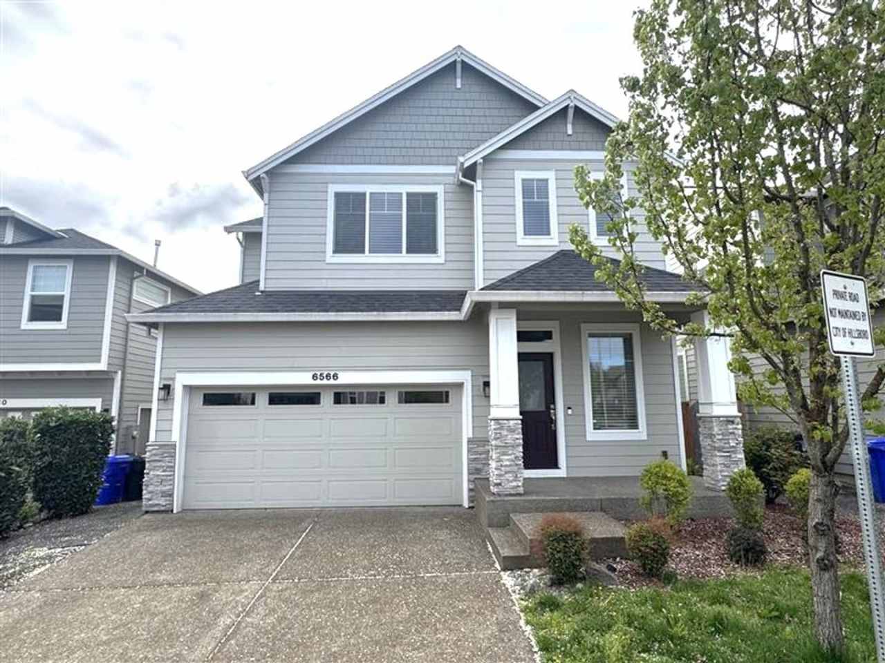 6566 NE Rainsong Lane ~ Magnificent 2-Story Home