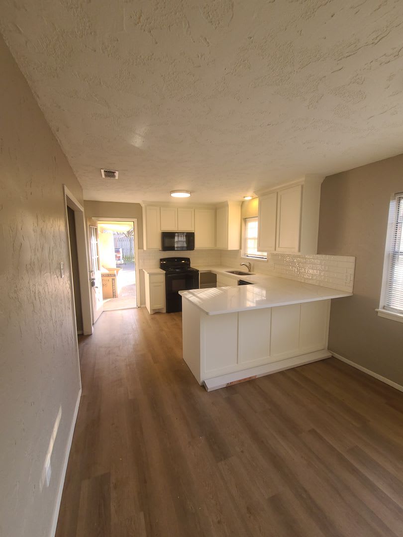 2/1.5 covered parking, fireplace