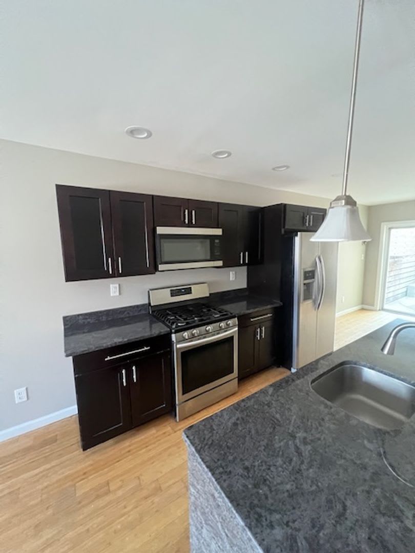 Stunning 3BD / 3BA Home with Rooftop Deck  Private Backyard — Ready to Call Home!