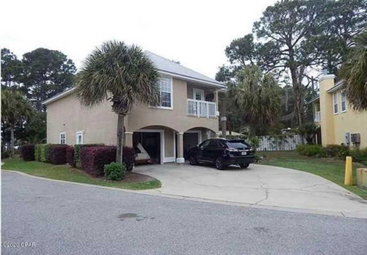 WATERFRONT W/BOAT SLIP!!!! This beautiful home is located in a gated community on North Lagoon Drive.