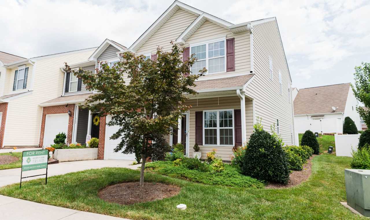 Immaculate beautiful 3-bedroom, 2.5-bath townhouse in Greensboro with 1 car garage/fenced in patio