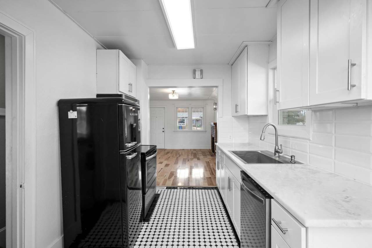 Newly remodeled 3 bedroom 2 bath brick bungalow on 1/4 acre lot!