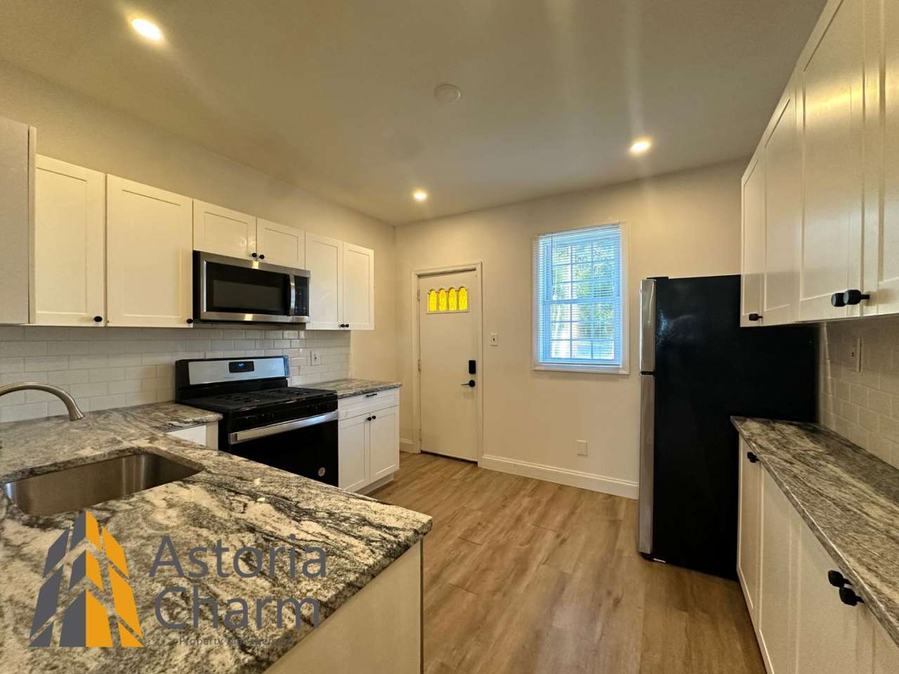 3 Bedroom or 2 Bedroom with Den featuring Fenced Yard and Updated Kitchen