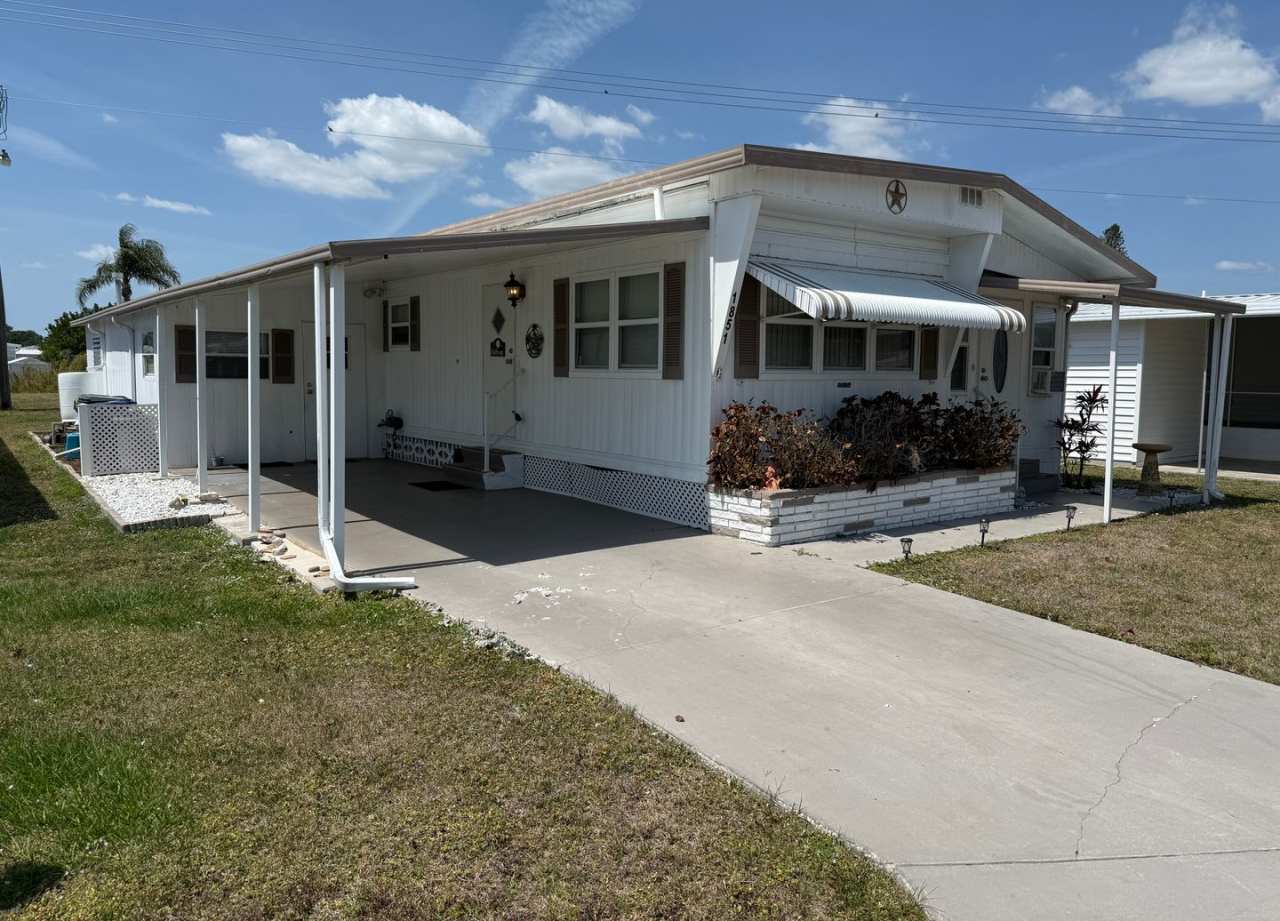 Enjoy this spacious 2-bedroom, 1-bath home in the vibrant 55+ community of Tri-Par Estates