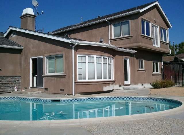 EAST FOOTHILLS - Ranch style retreat on 1.26 acres with serene hillside views.