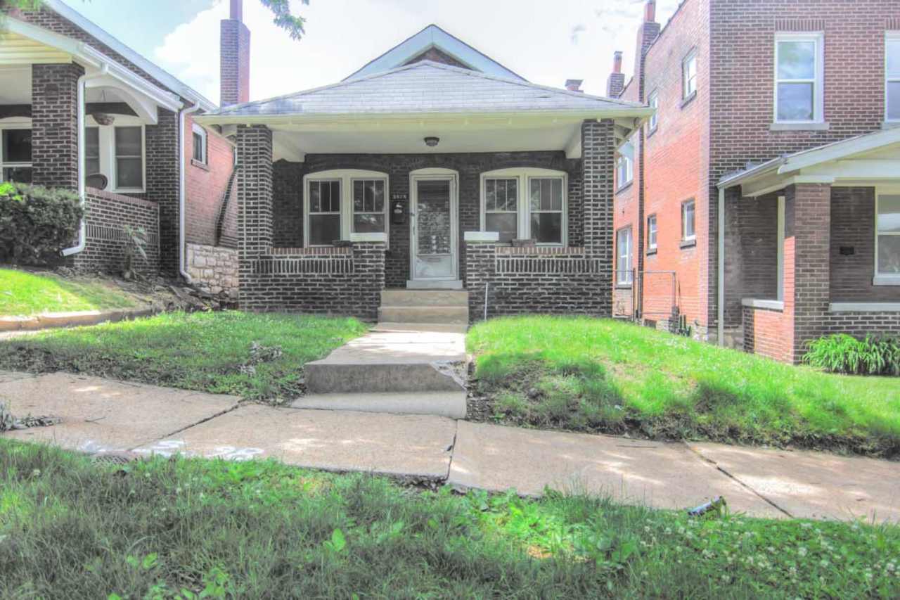 Nicely remodeled 2 bedroom 1 bath home in Tower Grove South with 2 car garage and fenced in yard!
