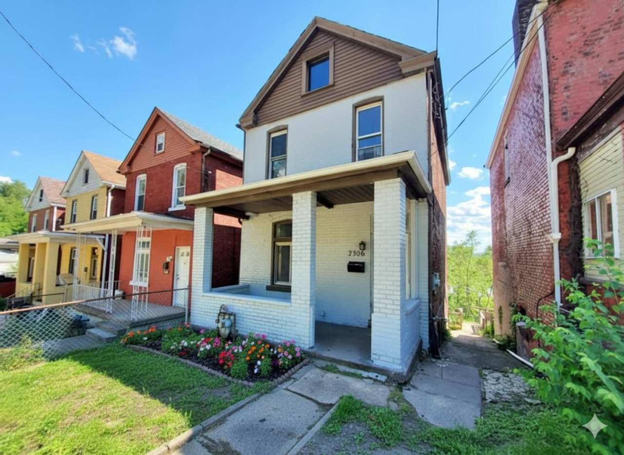 Updated flooring, finished basement, and great outdoor space in a walkable Swissvale location
