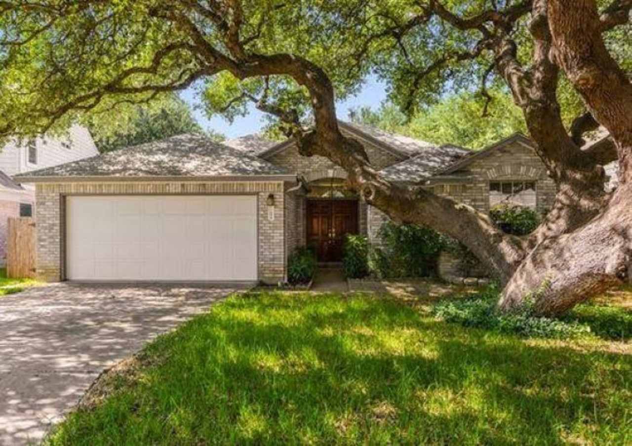 One Story With Open Floor Plan and Beautiful Oak Trees