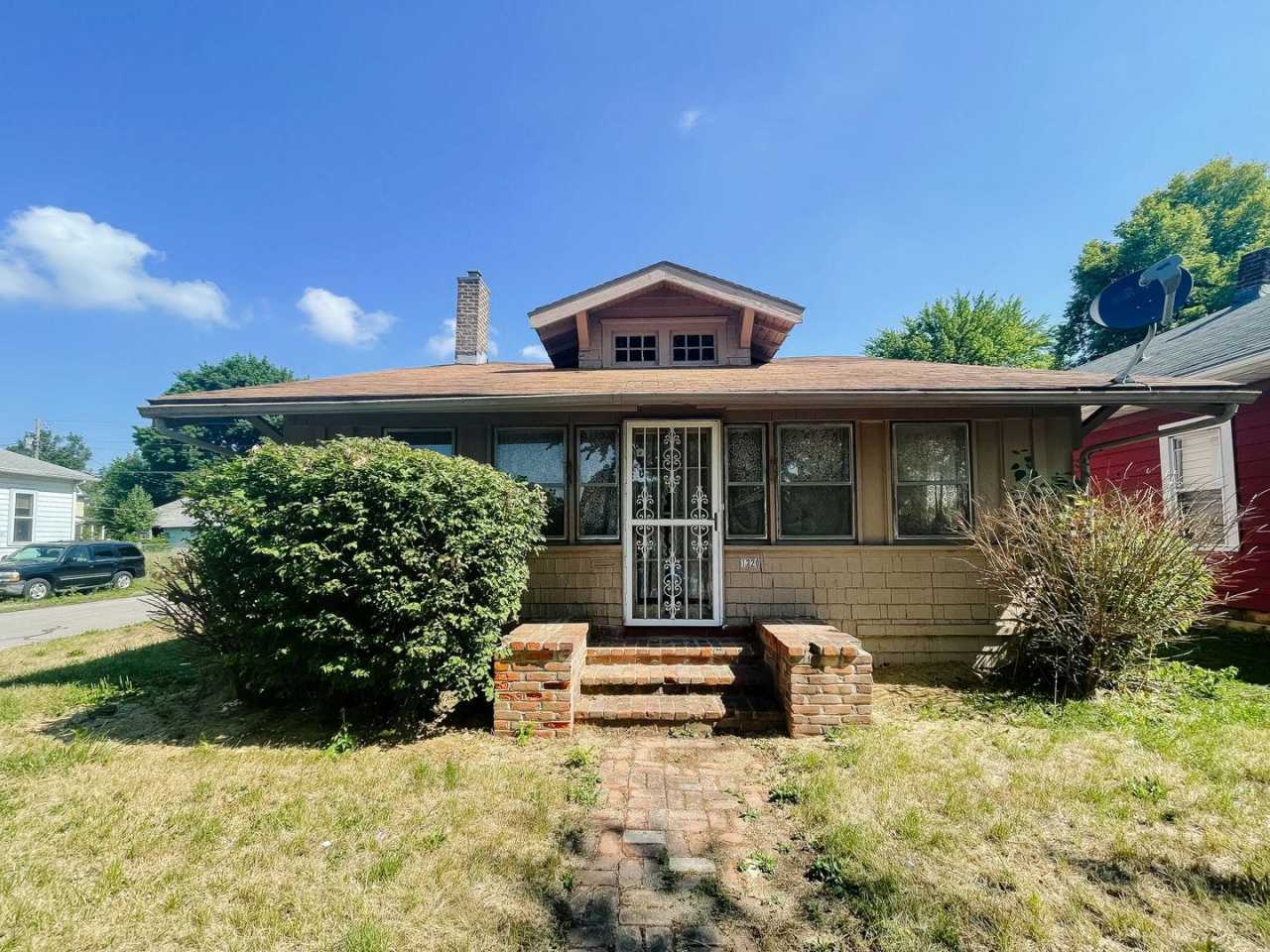 Attached Garage, Basement, and Shed