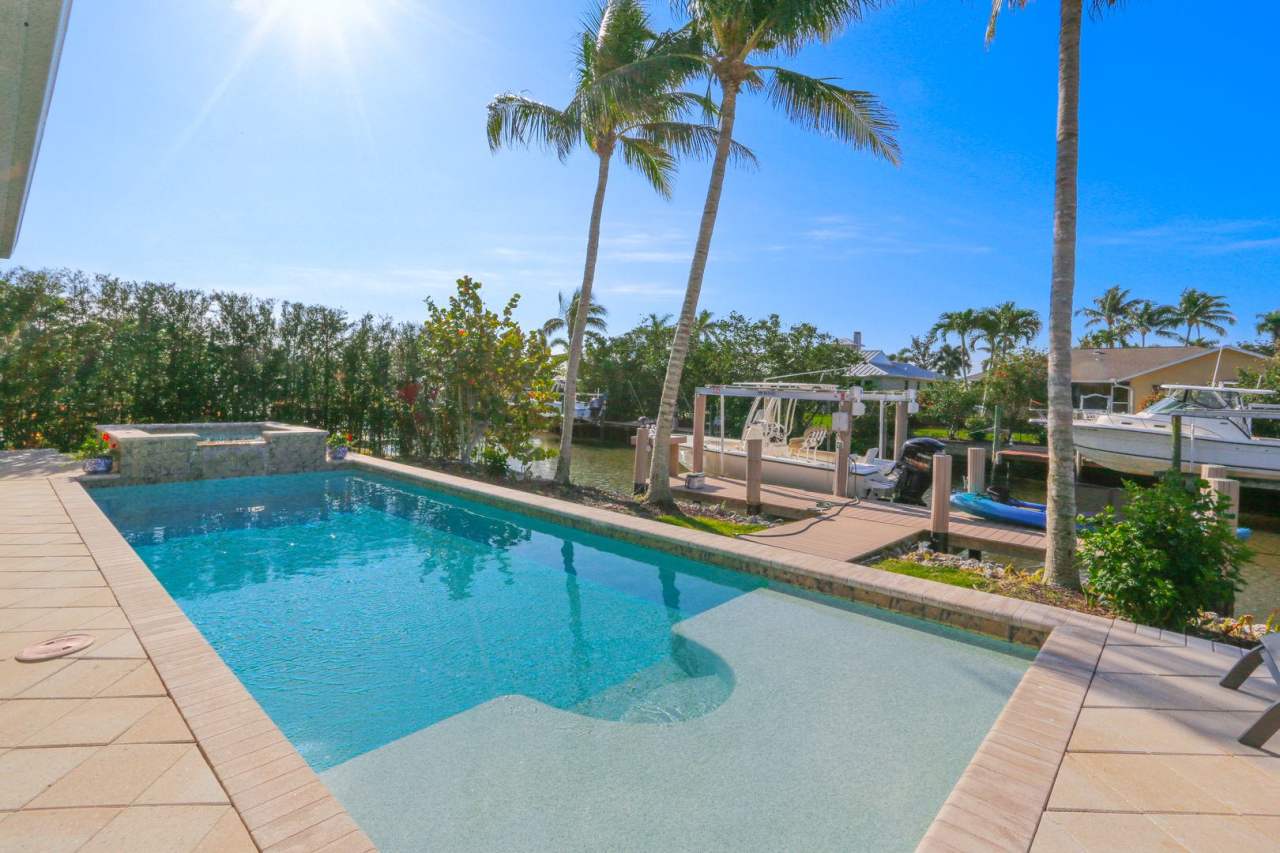 ***STUNNING POOL HOME***4BEDS / 4BATHS***GOLDEN SHORES***FURNISHED SEASONAL RENTAL***