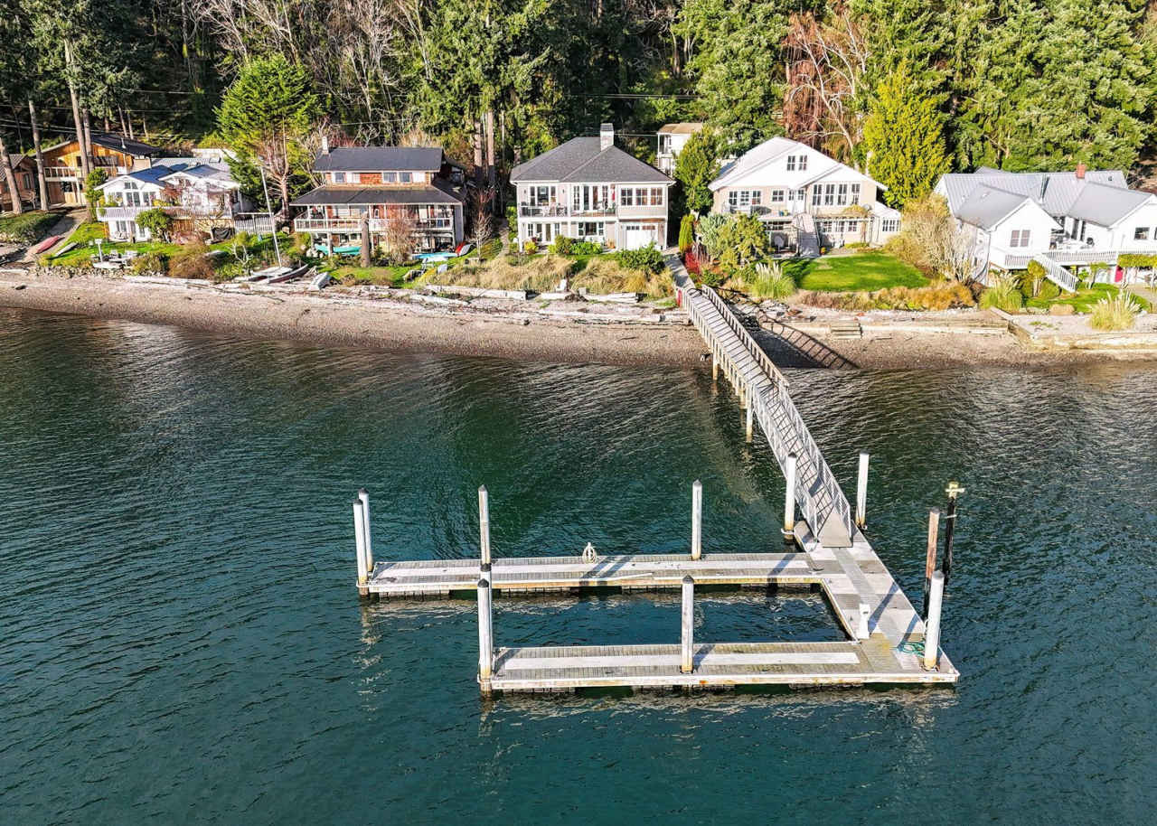 Impeccable Low Bank Bainbridge Waterfront Home with Private Dock