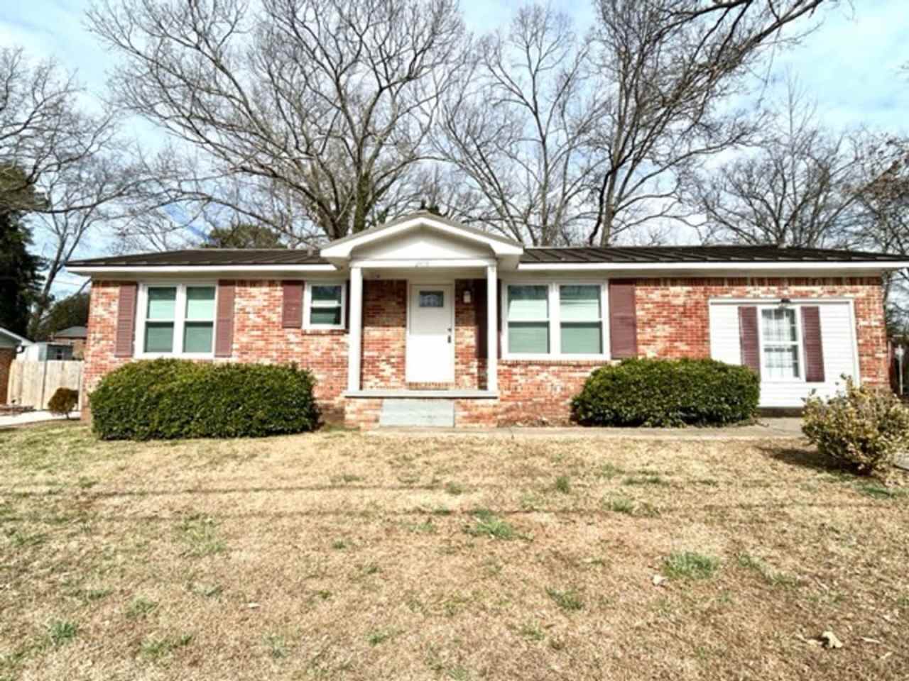 THREE BEDROOM ONE AND HALF BATH BRICK RANCH HOME