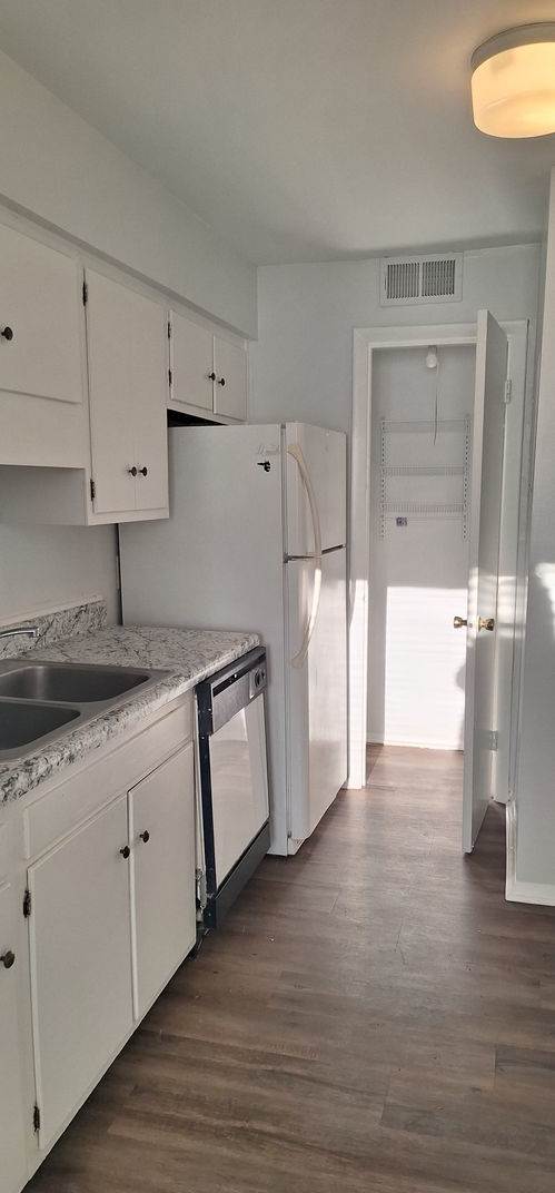 2 Bedroom Town Home Style, beautiful tree-lined property off Western Blvd in Raleigh.