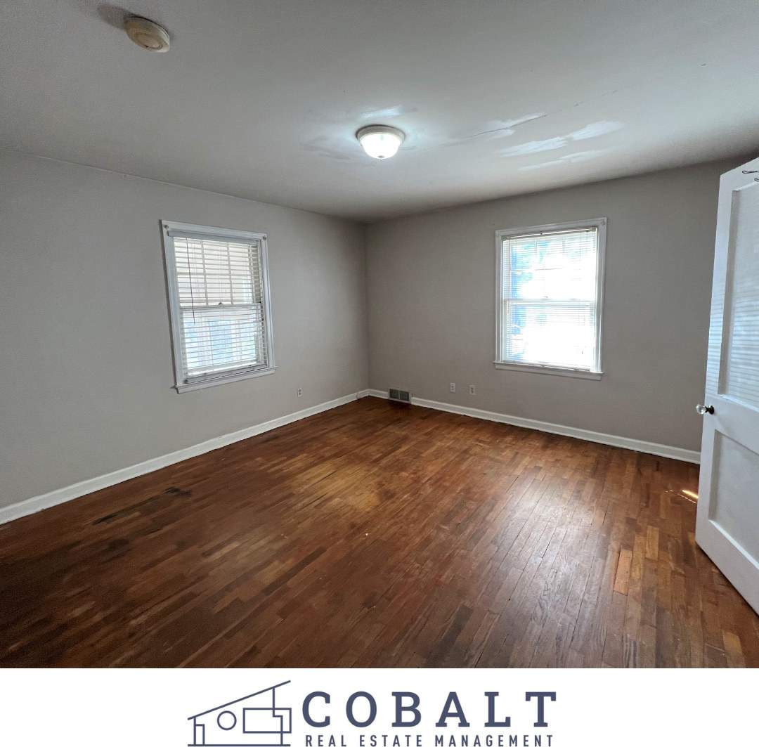 Steps from Kansas State University! Spacious 4-Bedroom Duplex