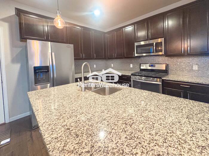 15476 West 64th Loop