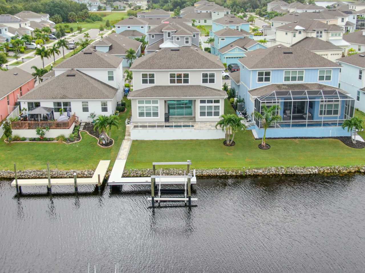 4 Bedroom 3.5 Bath Waterfront Pool Home in Gated Community