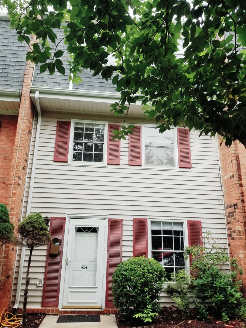A spacious 3-Bedroom 1.5-Bathroom 3 Story Townhouse off of Old Forest Road With a Pool