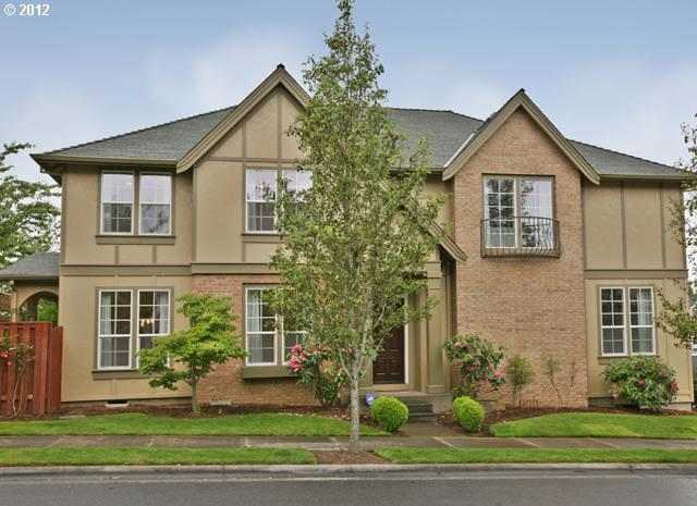 12702 NW Alsace Ln. ~ MAGNIFICENT CUSTOM HOME