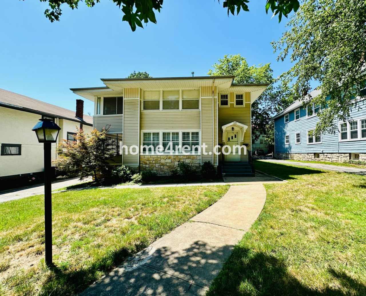 First Level Condo, Just Off the Plaza with Hardwood Floors and Lawn Care Provided!