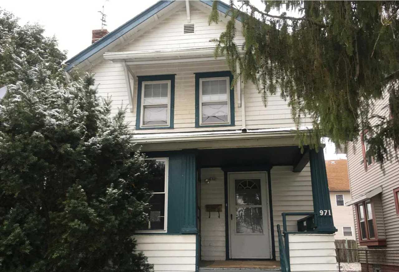 Charming 3-Bedroom Colonial with Finished Basement  Fireplace