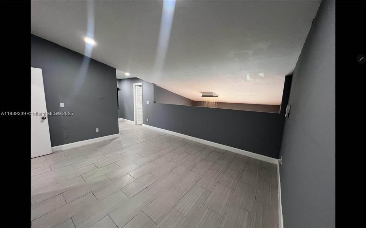 650 NW 210th St