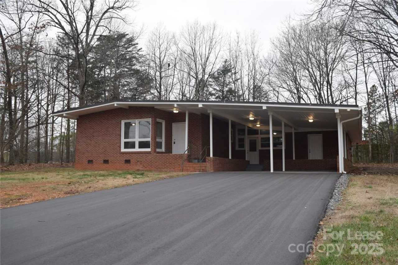 Charming 3 Bed 2 Bath Brick Home with Renovated Kitchen – $1800/Month