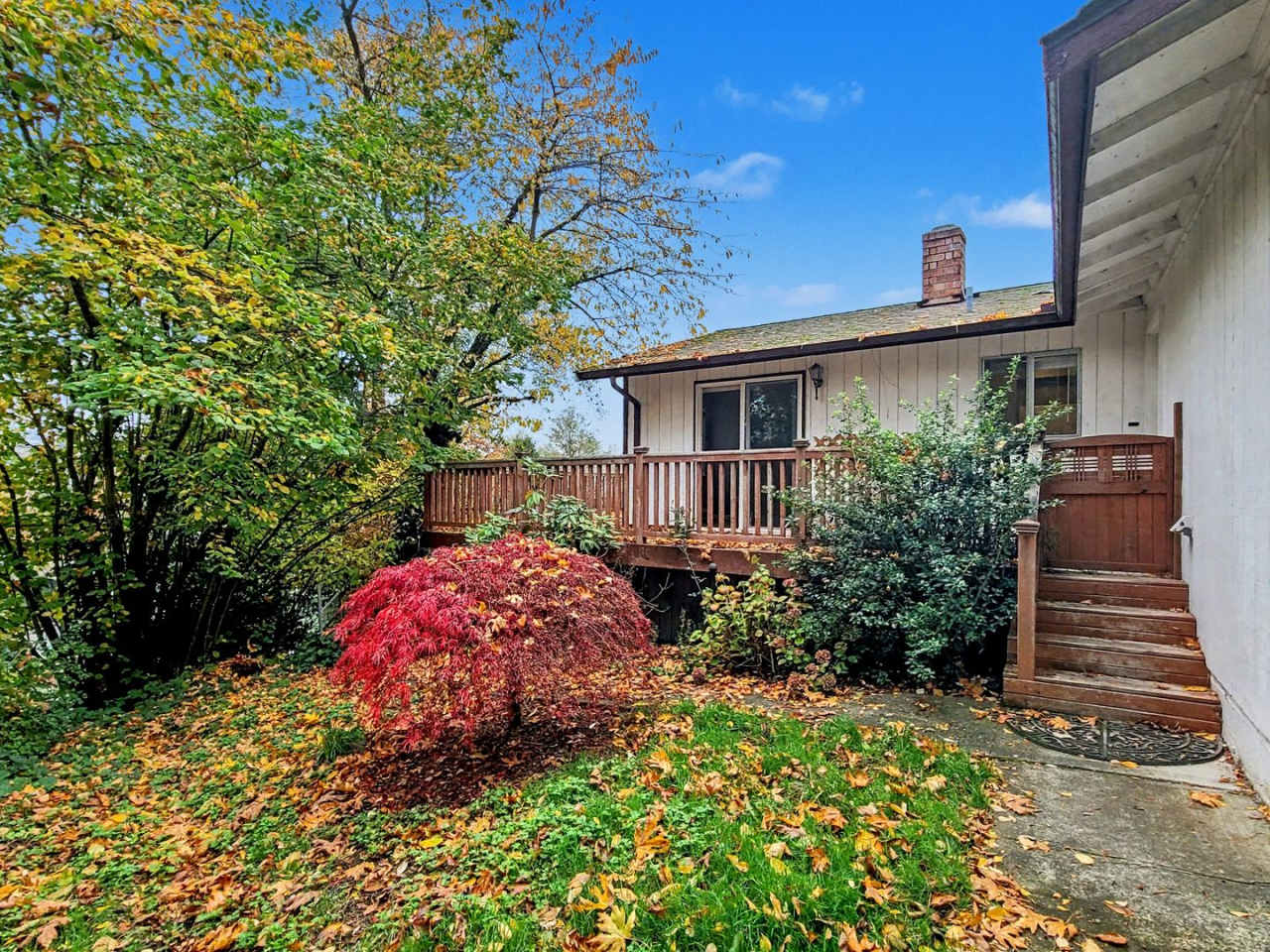 AVAILABLE NOW! Charming West Seattle Home featuring a garage, spacious deck, and wood-burning fireplace